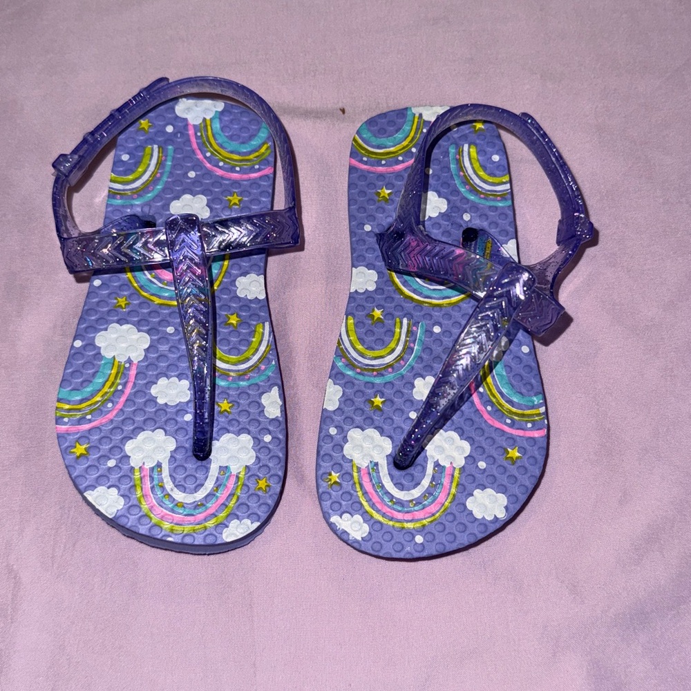 Never worn Purple Rainbow and sparkle Flip Flops